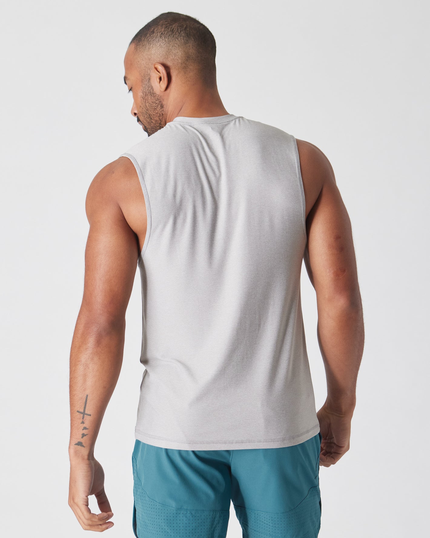 Back view of man in Light Heather Gray Active Sleeveless Muscle Tee.