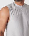 Man wearing Light Heather Gray Active Sleeveless Muscle Tee, showcasing comfort and fit.