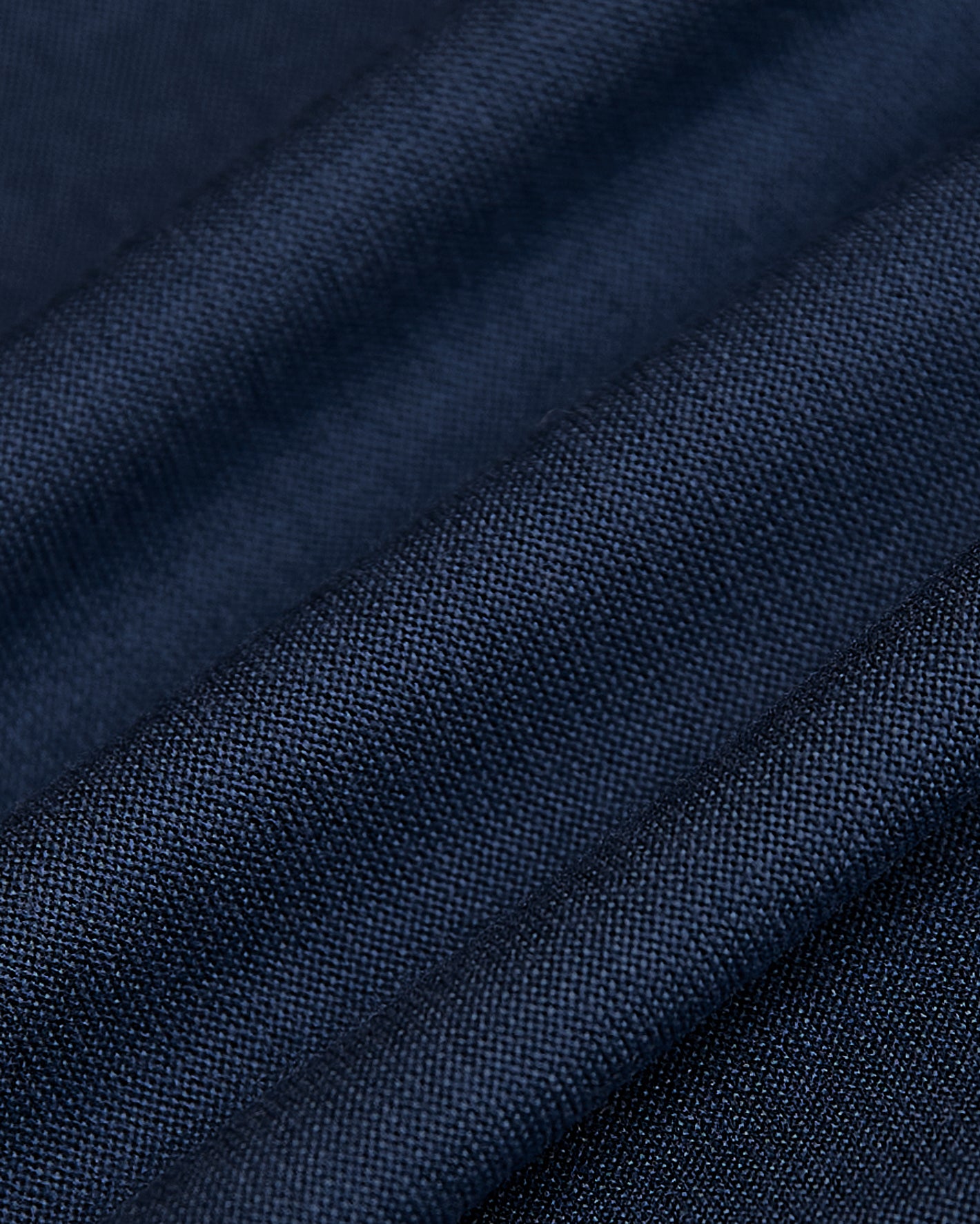 Dark Heather Navy Sleeveless Active Muscle Tee fabric close-up, showcasing weave texture.