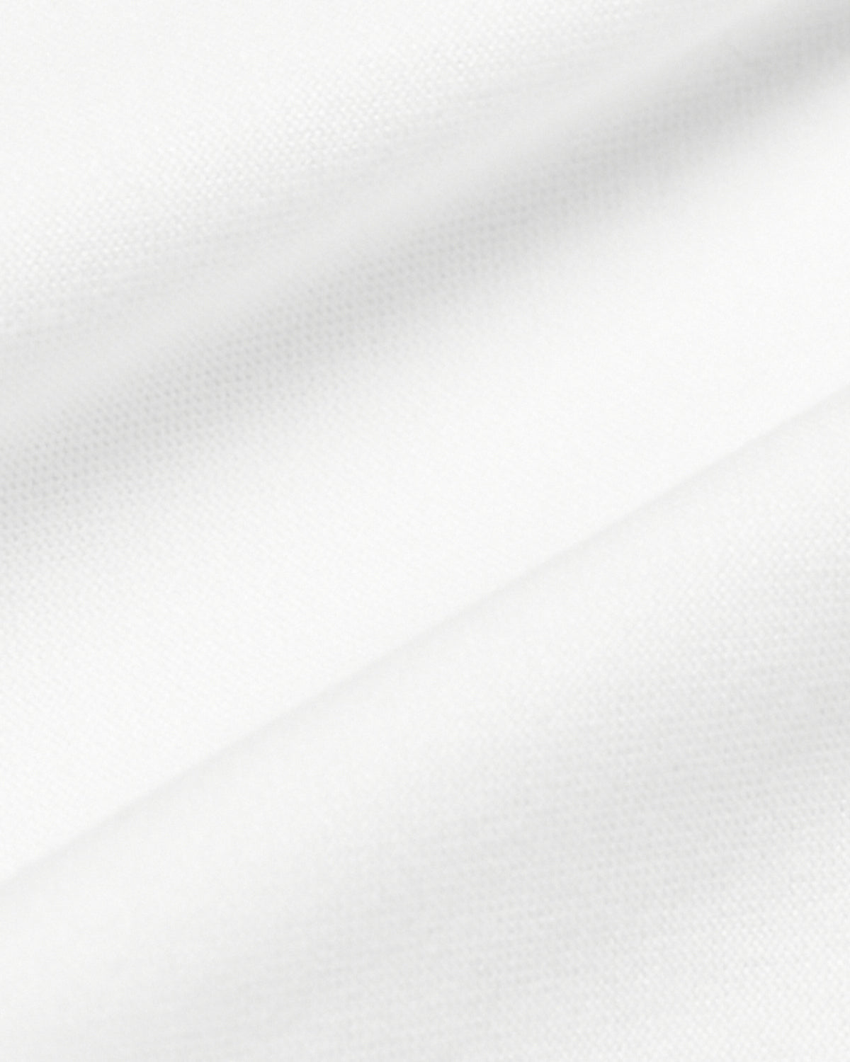 White Sleeveless Active Muscle Tee, close-up of soft, woven fabric texture.