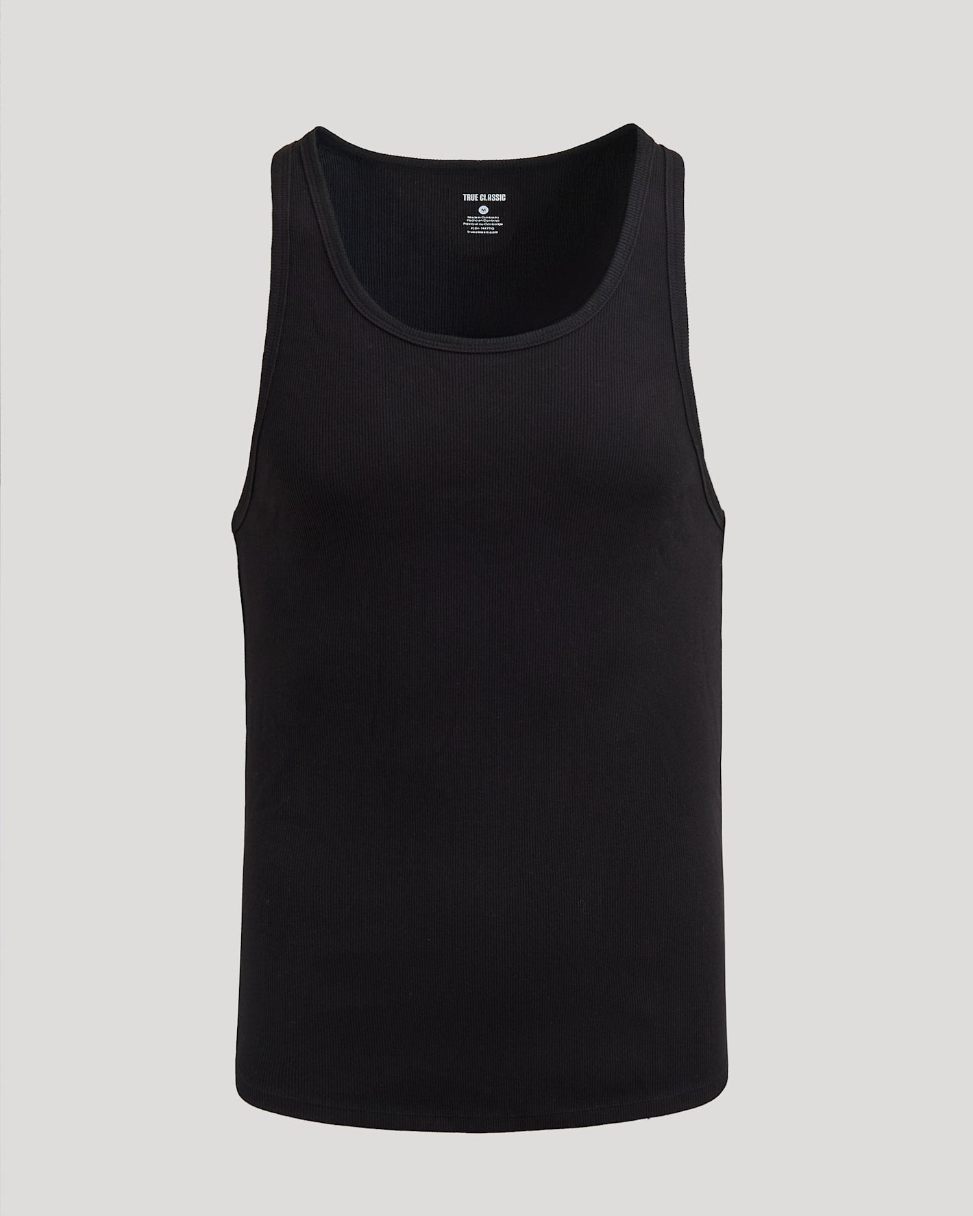 Black tank top on a light gray background