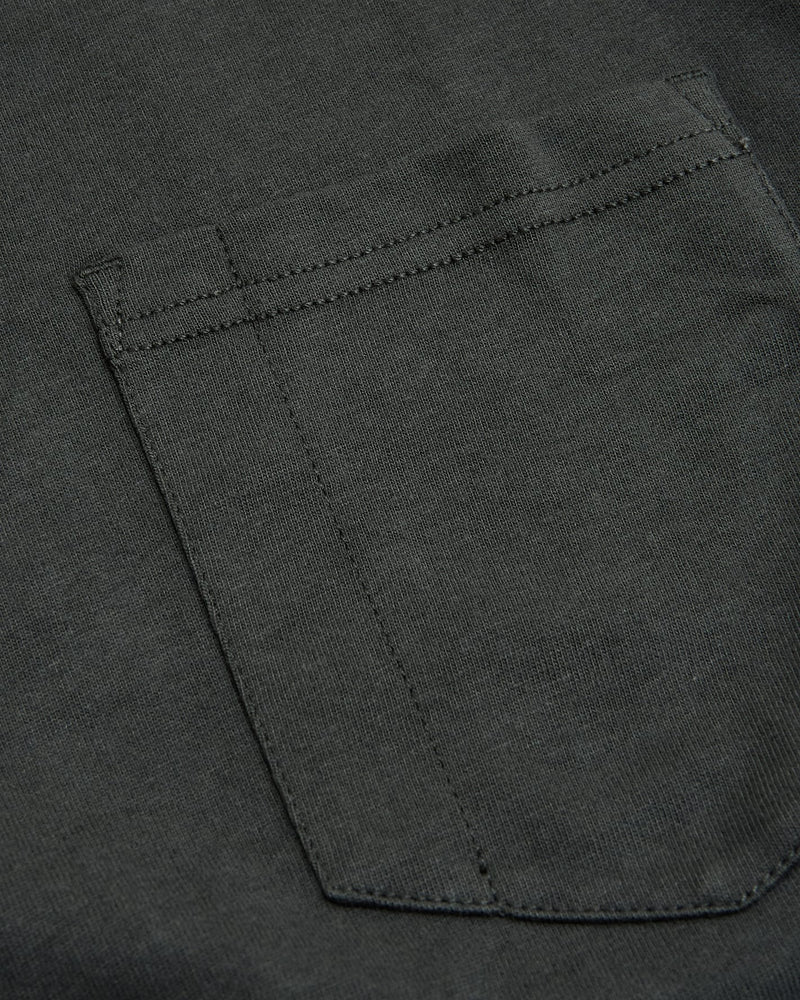 Carbon Heavyweight Pocket Crew with visible pocket stitching and durable knit fabric.