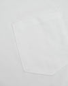 White Heavyweight Pocket Crew showcasing stitched pocket and durable fabric.