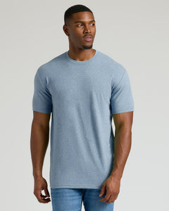 True ClassicHeather Indigo Tall Straight Hem Crew Neck T-Shirt worn by a relaxed man.