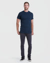 Man wearing Navy Tall Straight Hem Crew Neck T-Shirt, slim-fit jeans.