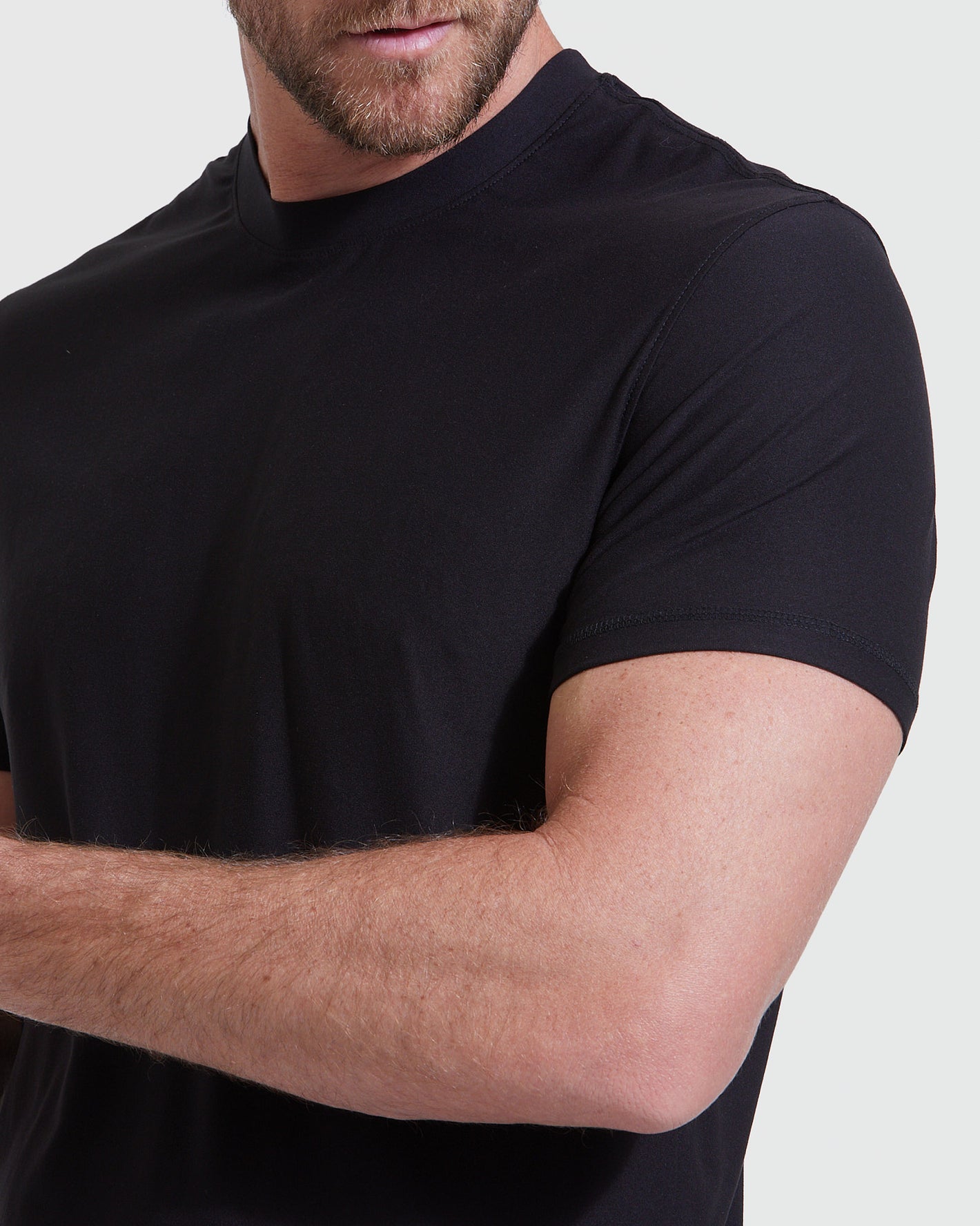 Black Tall Active Crew Neck 2.0 worn by model, showcasing fit.