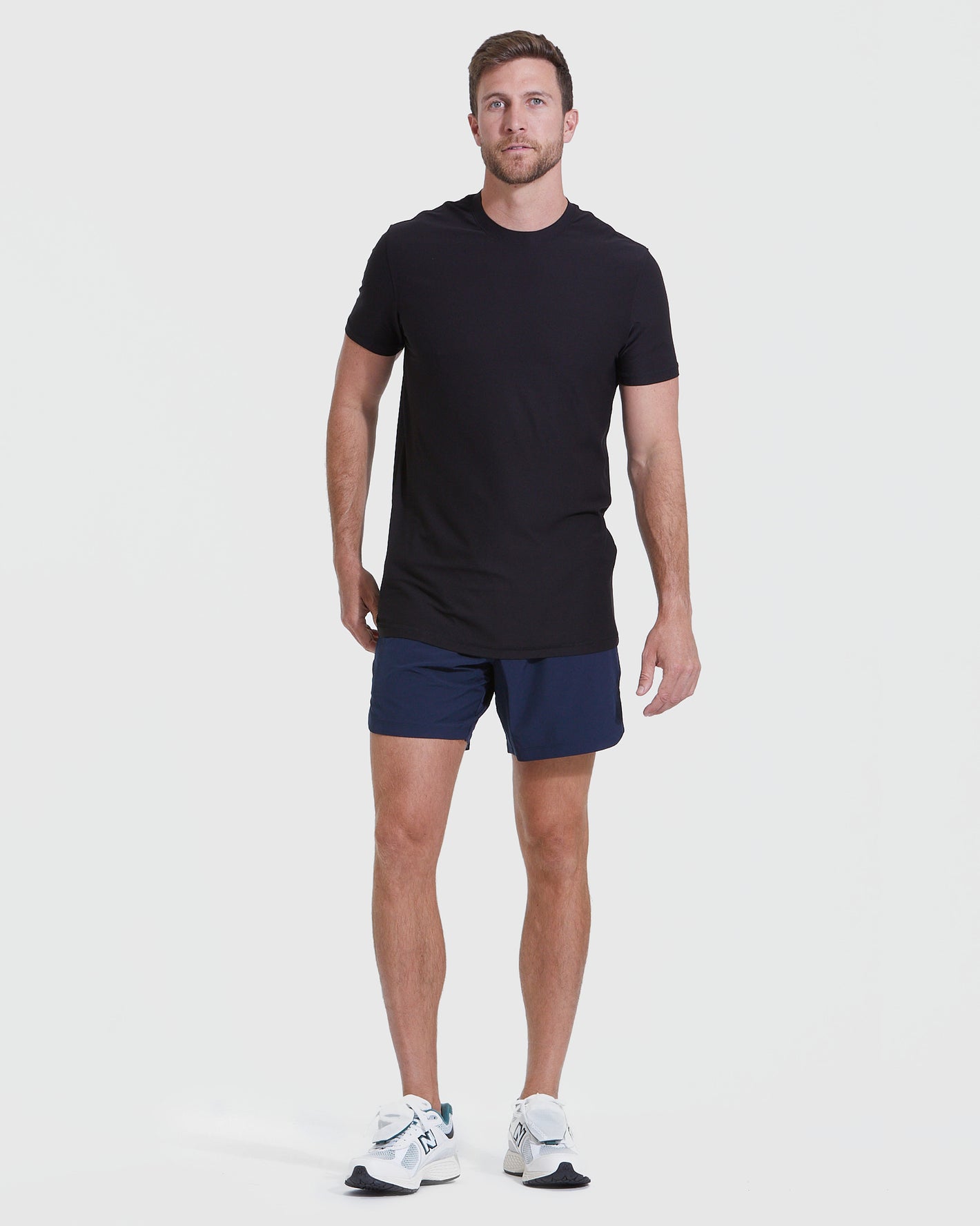 Black Tall Active Crew Neck 2.0 on model in athletic stance.