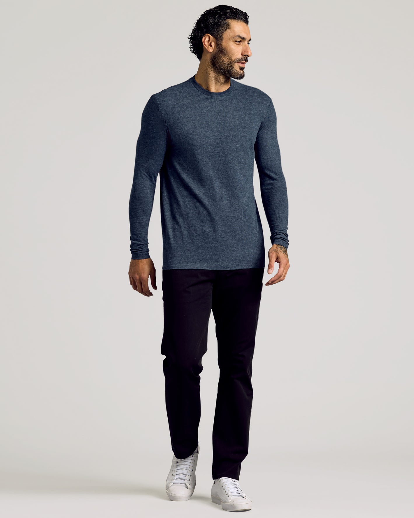 Heather Navy Tall Long Sleeve T-Shirt on male model walking.