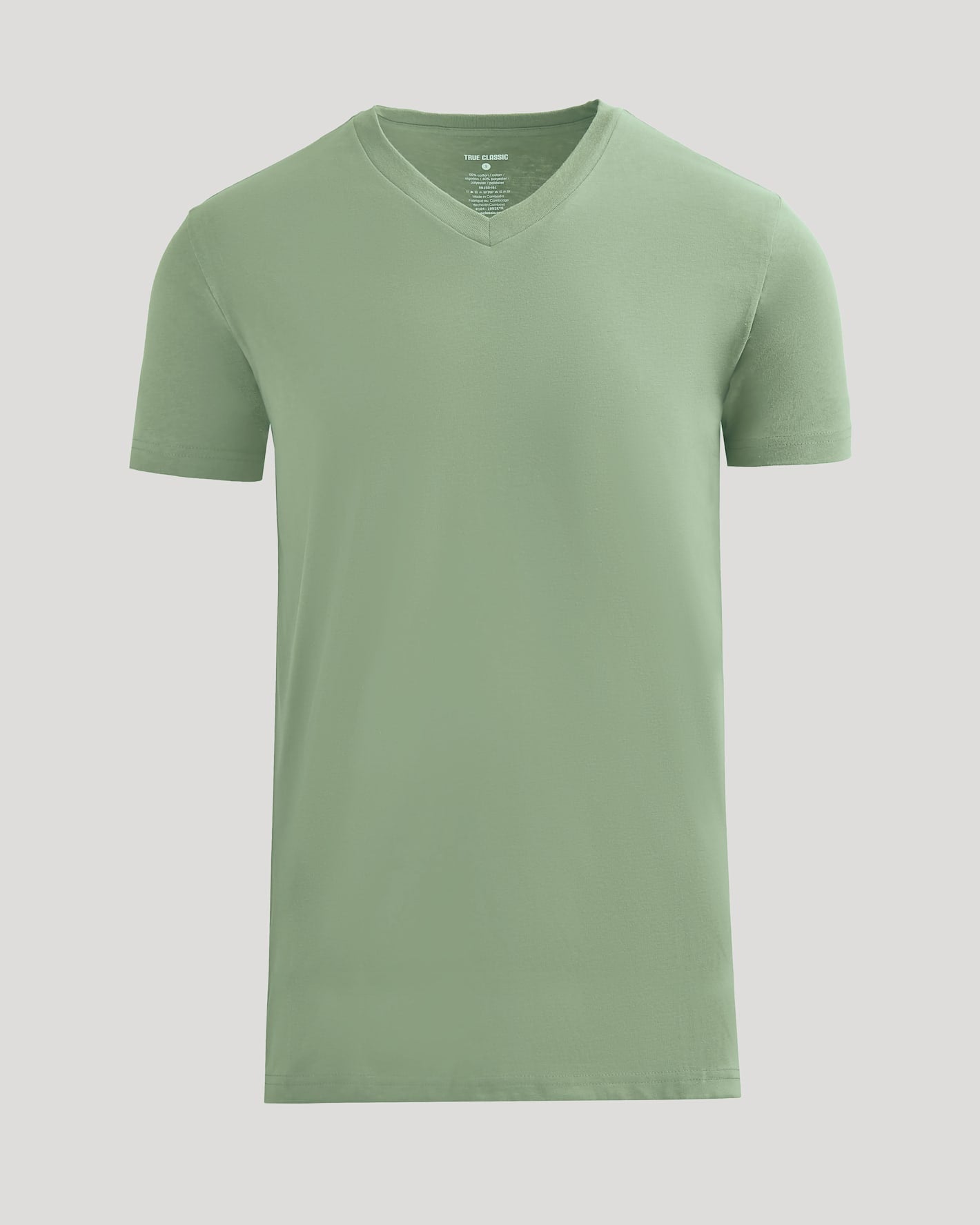 Green t-shirt on a light gray background