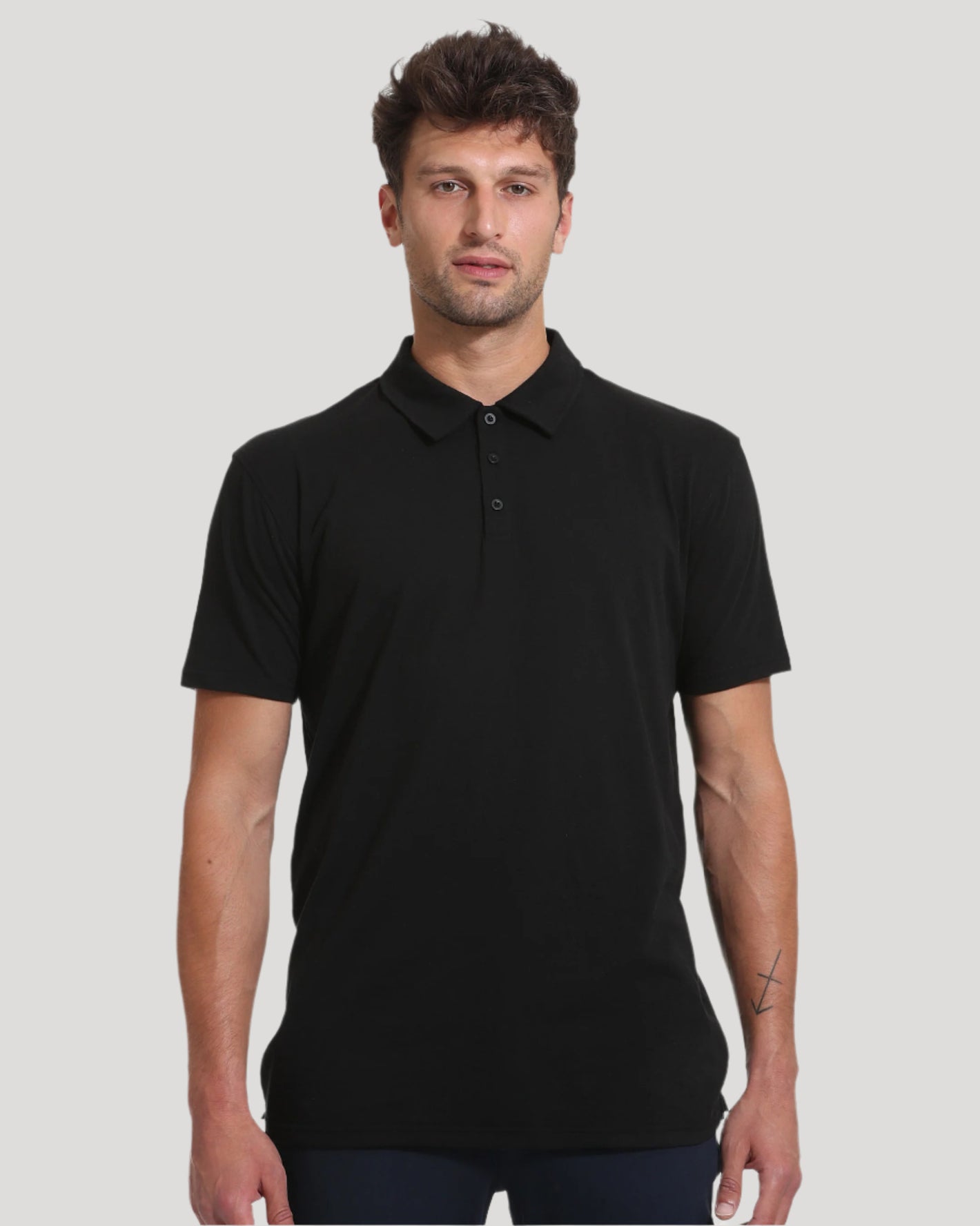 Black & White Tall Classic Polo 10-Pack on male model, showcasing fit.