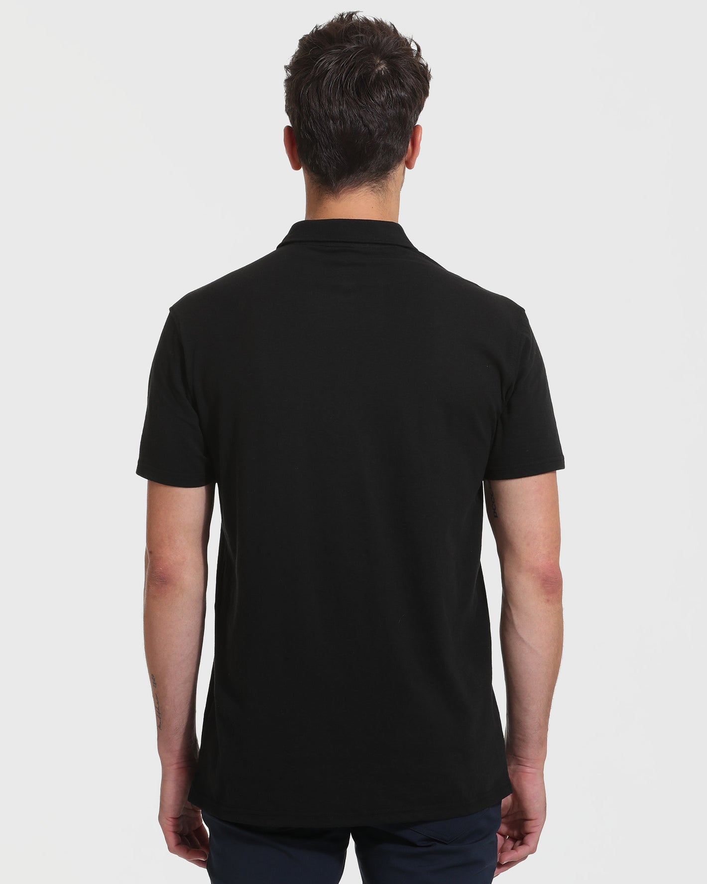 All Black Tall Classic Polo 10-Pack shown from the back.
