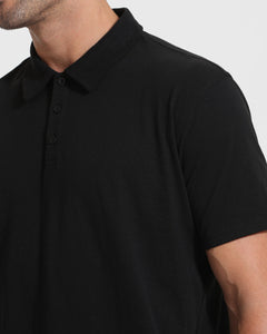 True ClassicBlack & White Tall Classic Polo 10-Pack showcasing black polo's fit and collar.