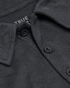Carbon Short Sleeve Tall Polo, close-up of charcoal knit fabric, collar, buttons.