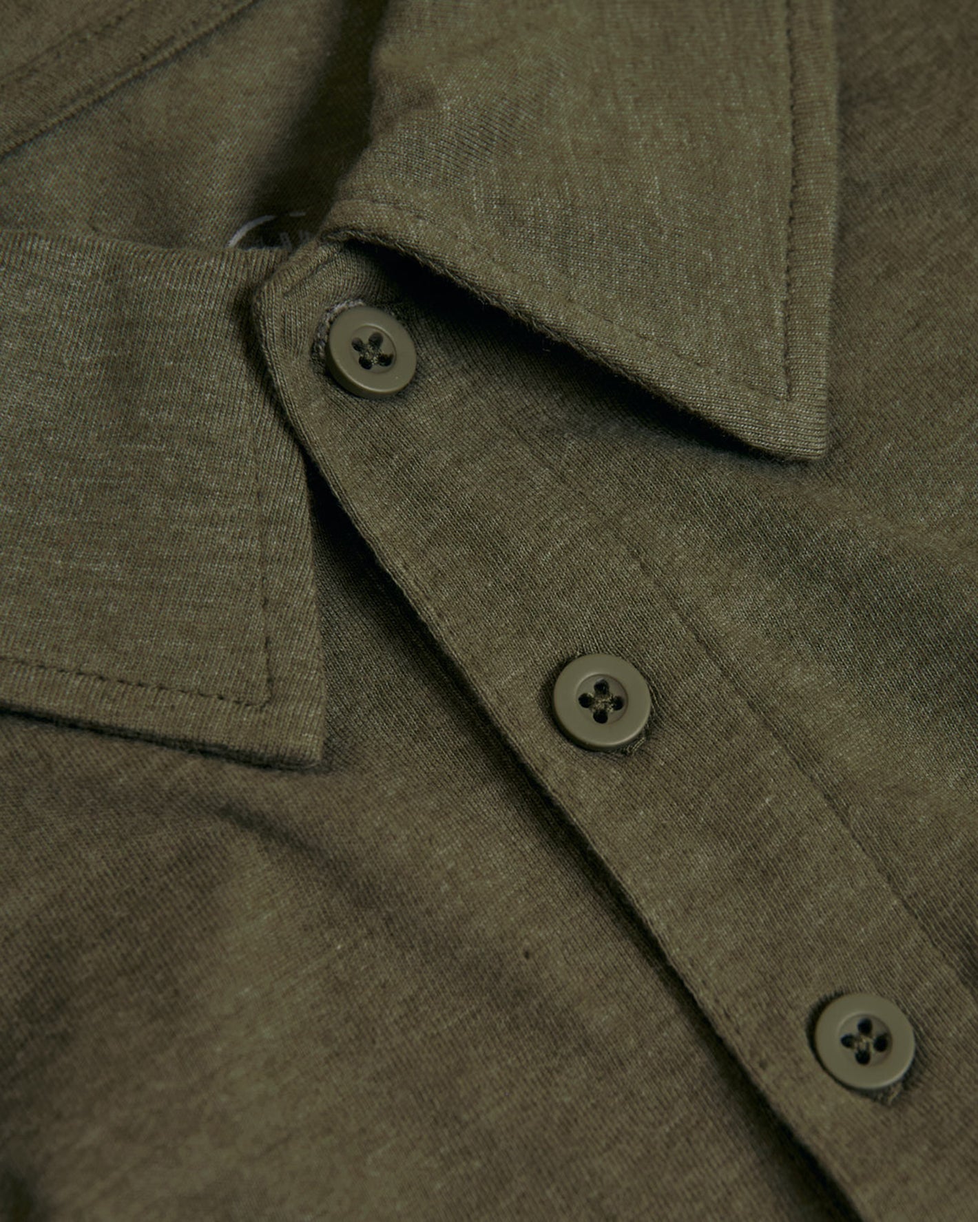 Heather Military Green Short Sleeve Tall Polo with folded collar and buttons.