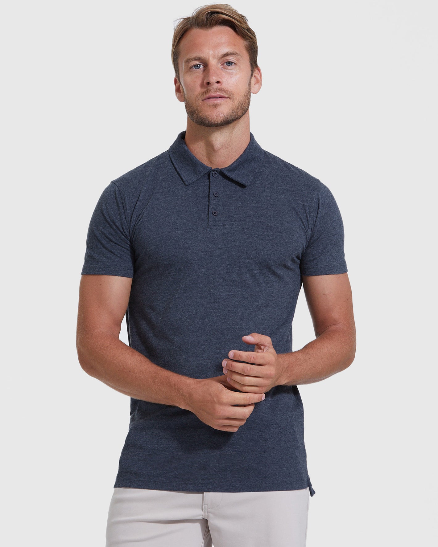Heather Navy Short Sleeve Tall Polo on male model, showcasing perfect fit, ultra-soft fabric.