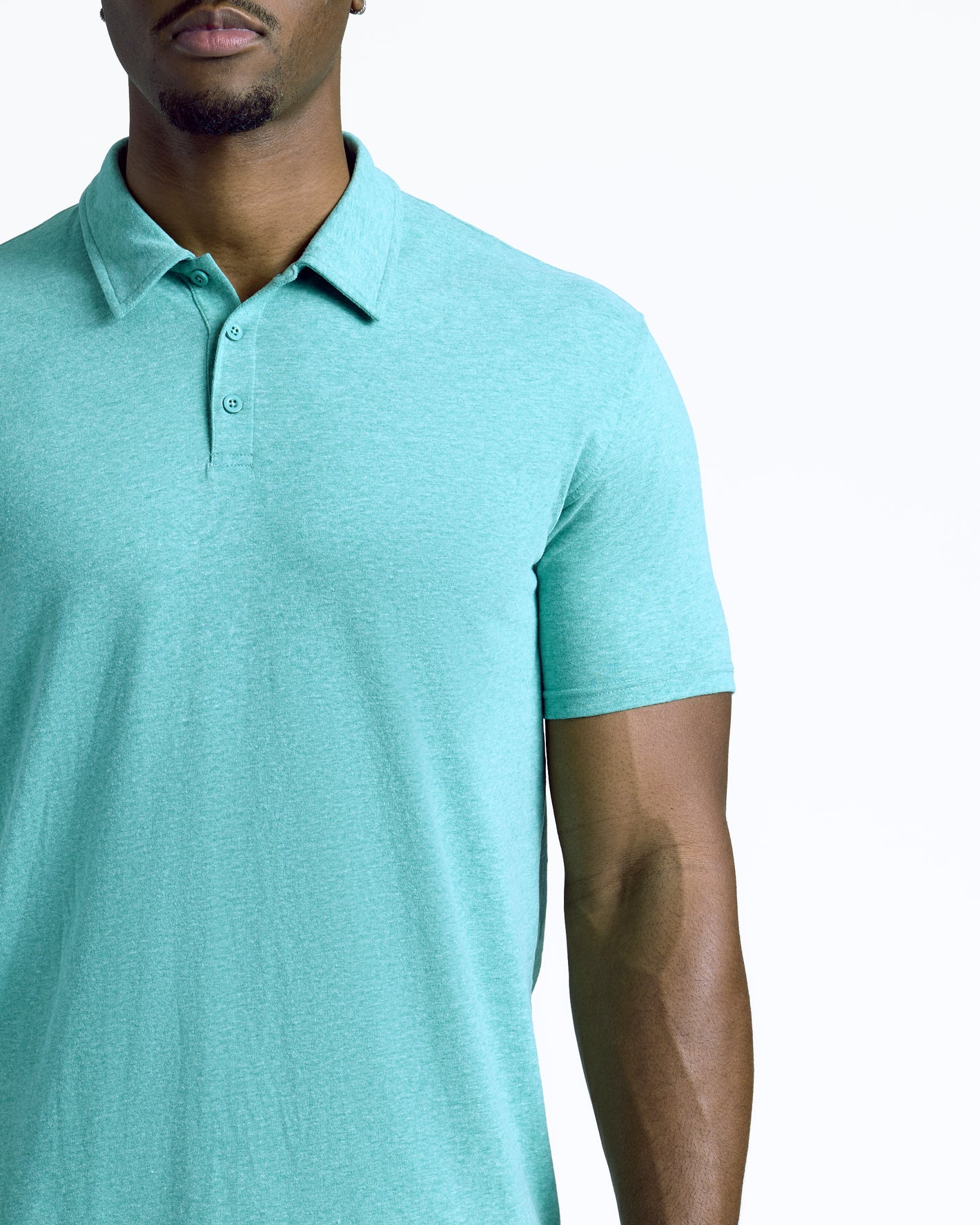 Light Heather Greenery Short Sleeve Tall Polo with collar and two buttons visible.