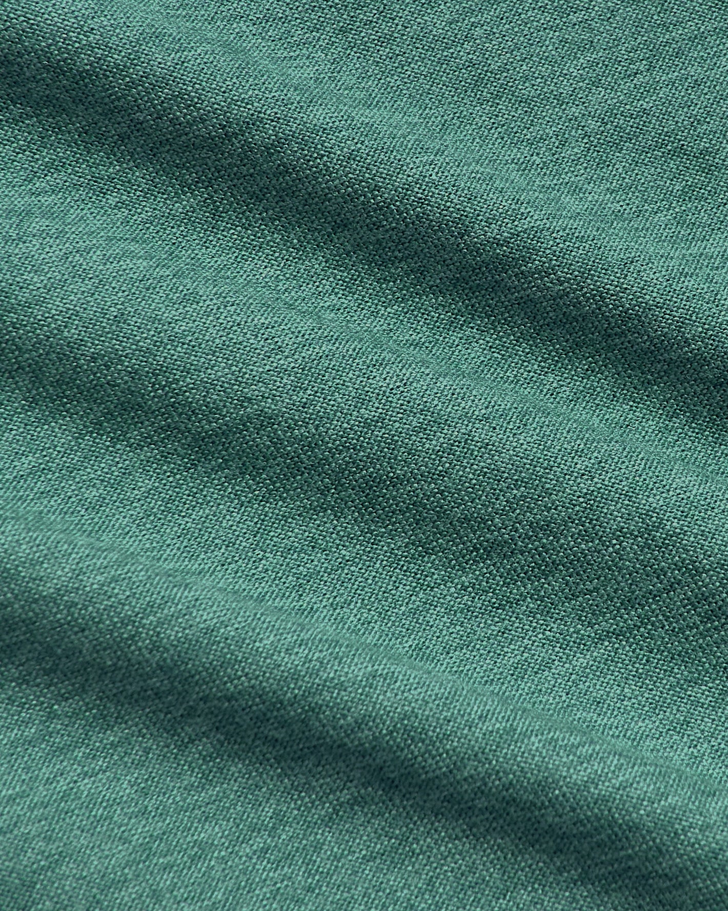Evergreen Tall Active Crew Neck 2.0 close-up of teal knit fabric.