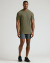 Military Green Tall Active Crew Neck 2.0 on young man standing.