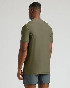 True ClassicTall Active Crew 3-Pack: Man wearing slim olive-green tee and dark shorts.