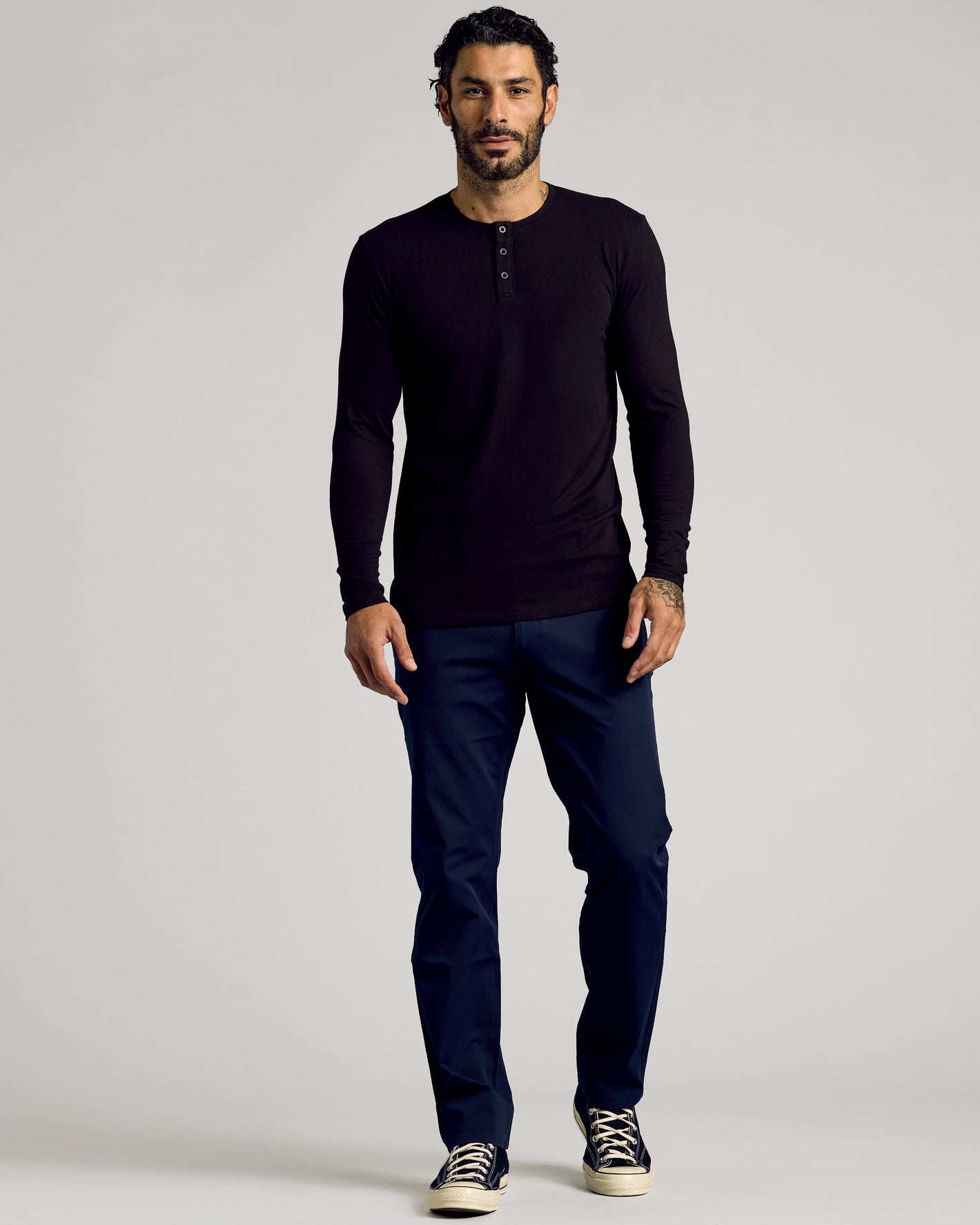 Man wearing Black Tall Classic Long Sleeve Henley, showcasing fit and style.