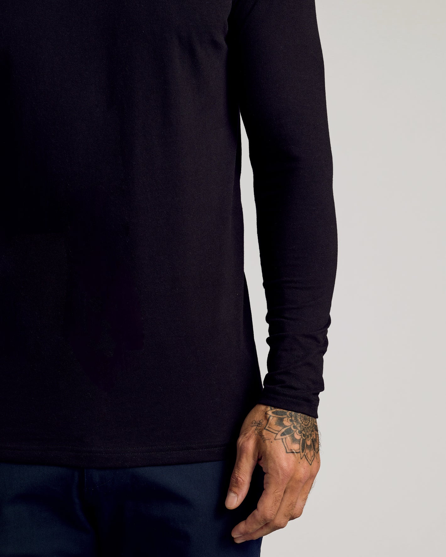 Black Tall Classic Long Sleeve Henley with snug fit and button placket.
