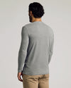 Man wearing Heather Gray Tall Classic Long Sleeve Henley, seen from behind.