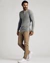 Man in Heather Gray Tall Classic Long Sleeve Henley, tan pants, white sneakers.