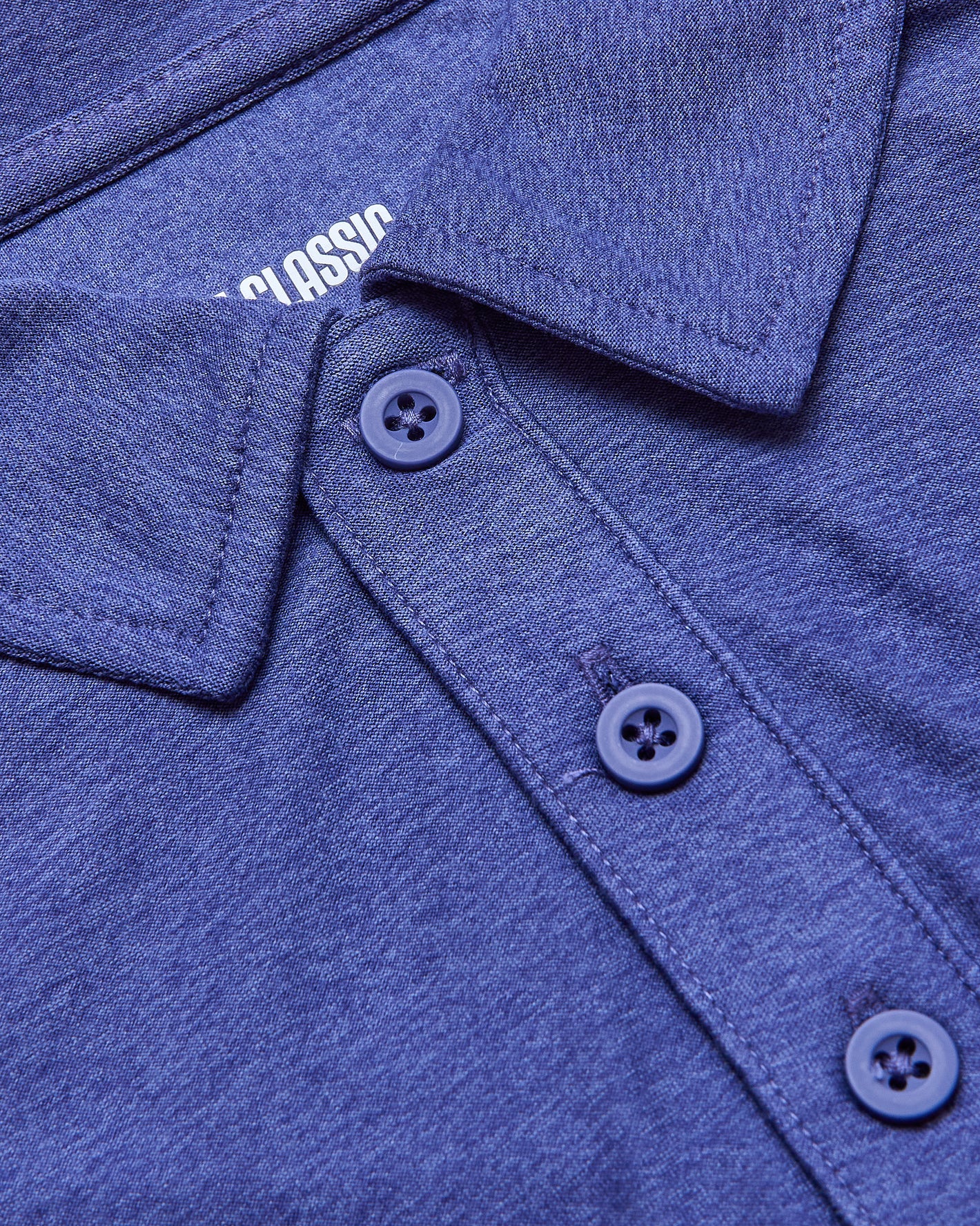 Cosmos Short Sleeve Tall Active Polo with collar and 3-button placket.
