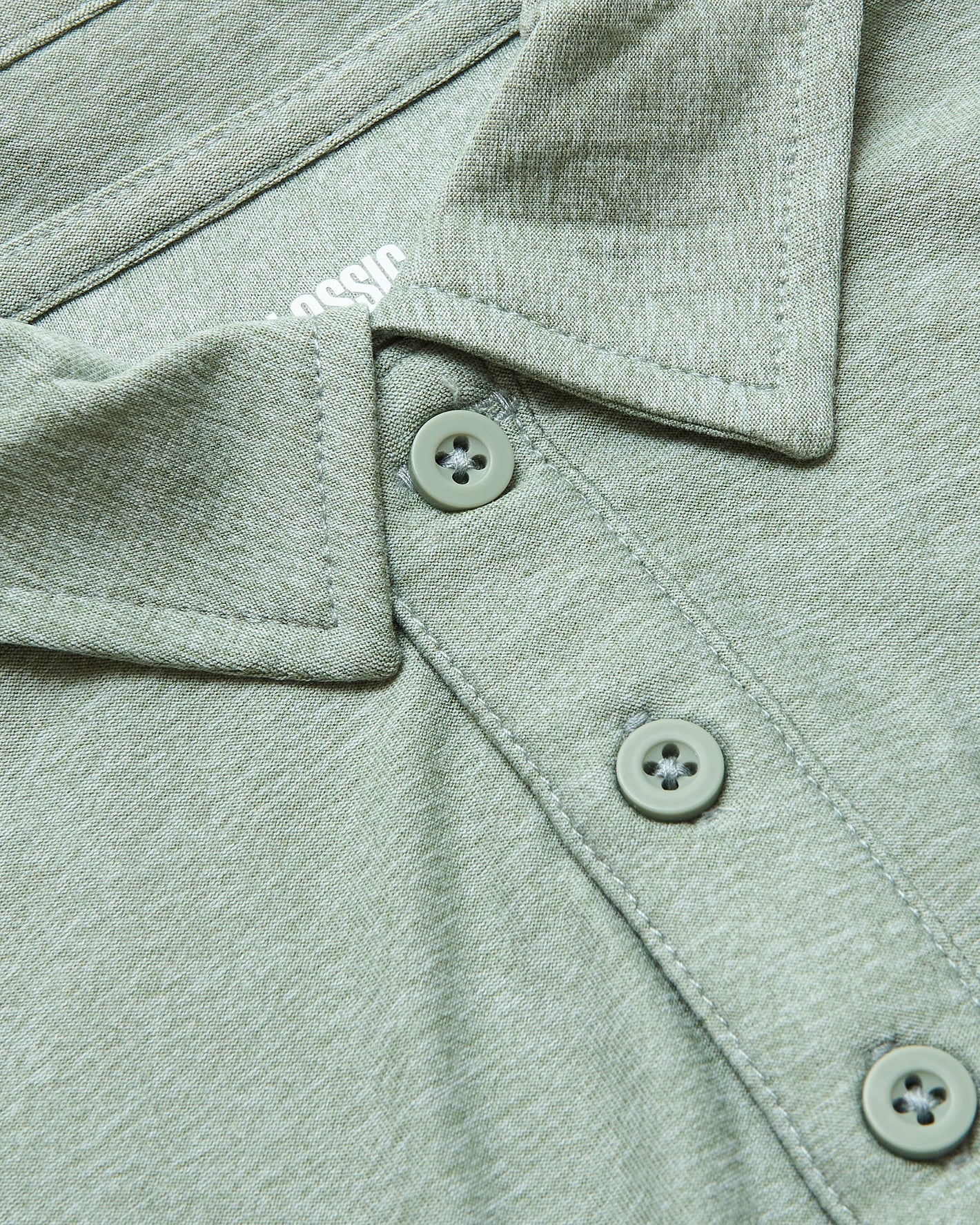 Lichen Short Sleeve Tall Active Polo collar detail with buttons.