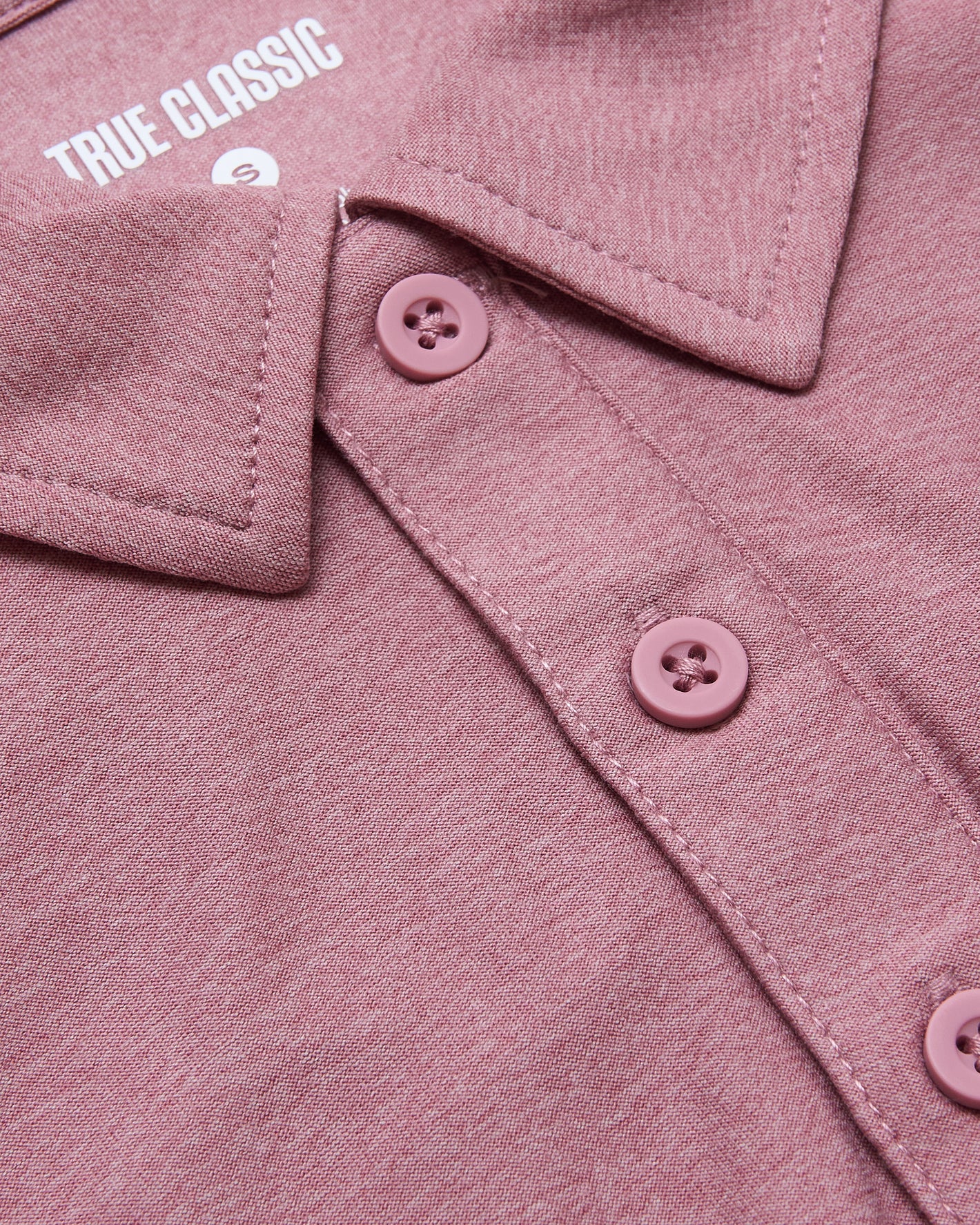 Quartz Rose Short Sleeve Tall Active Polo with fold-over collar and button placket.