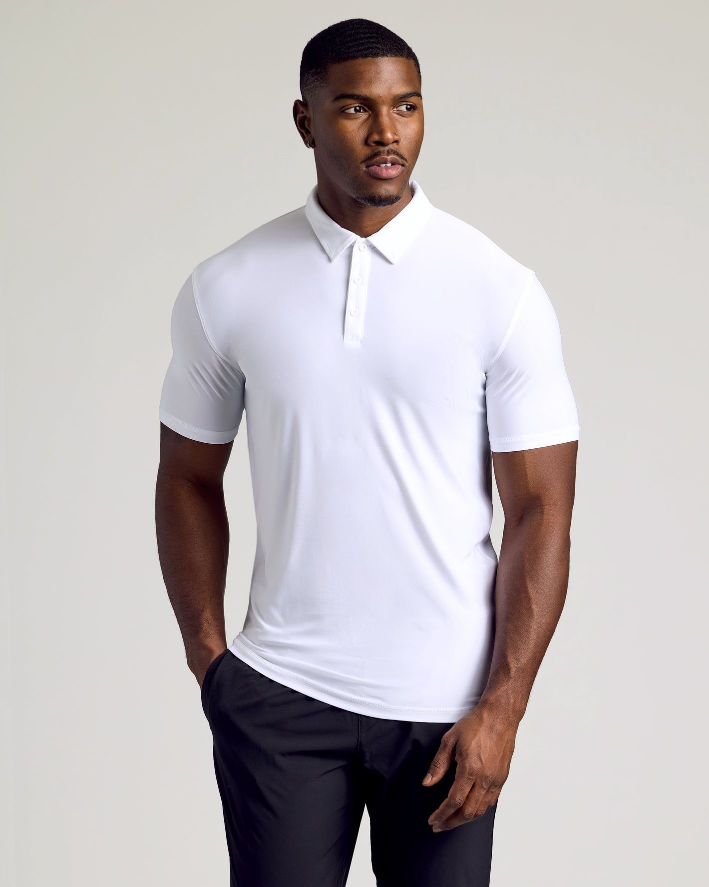 Young man in Black & White Tall Active Polo.