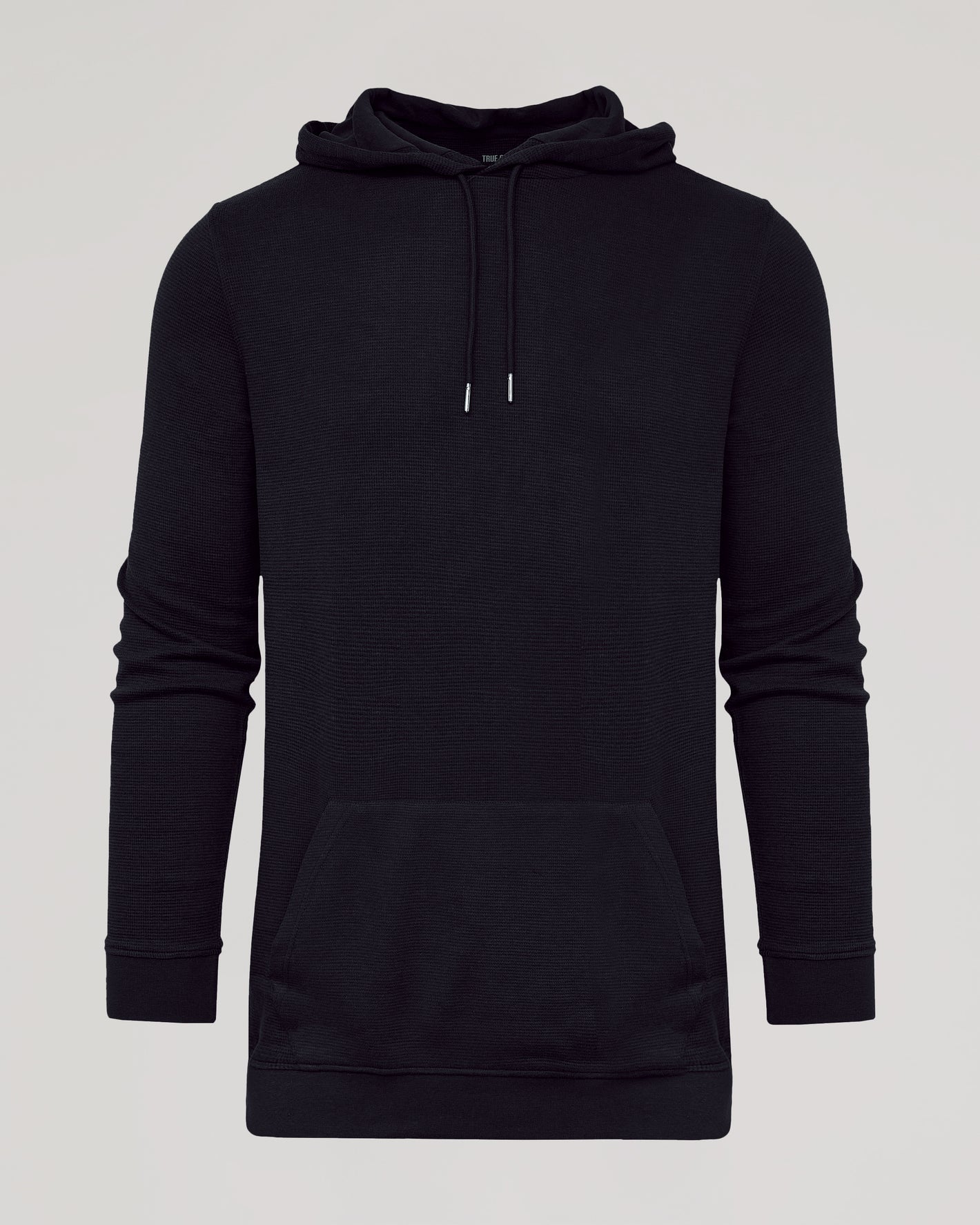 Black Tall Waffle Hoodie with drawstring hood, ribbed cuffs, and kangaroo pocket.