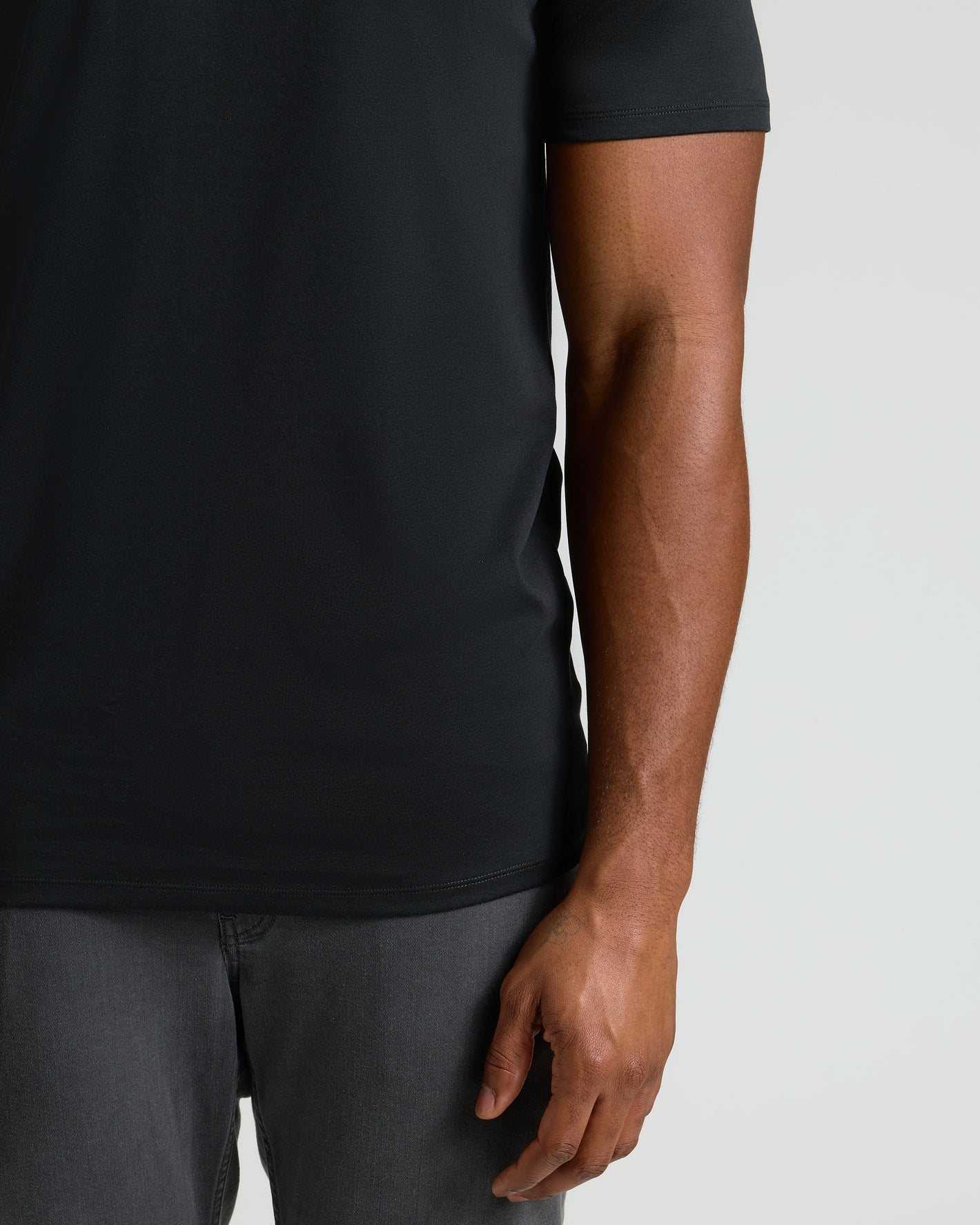 Tall Pima Variety 2-Pack: black T-shirt showcased on model.