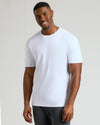A smiling man wearing a clean white crew neck t-shirt, showcasing the Tall Pima Cotton Blend Crew 4-Pack as a comfortable and stylish men's basics essential.