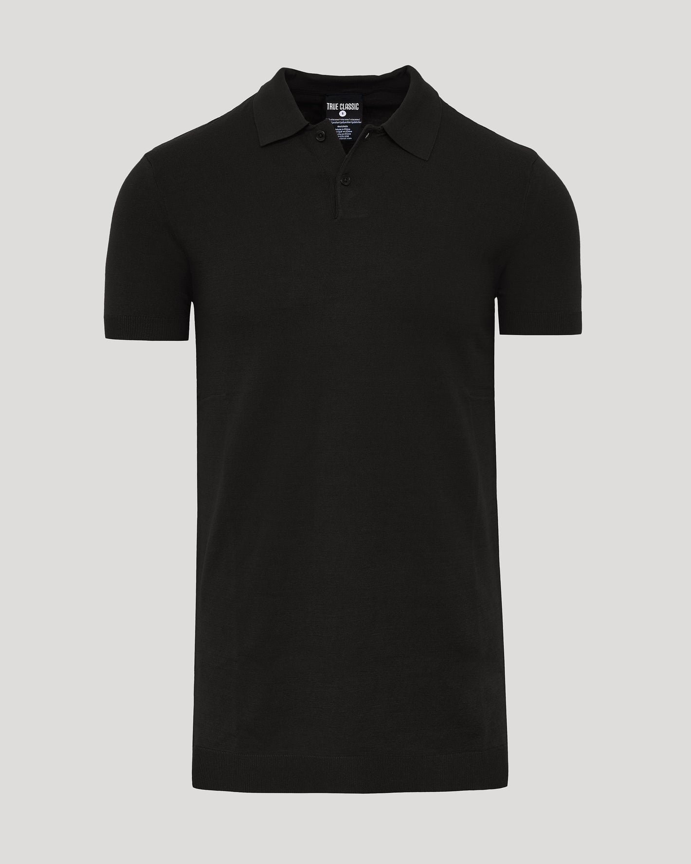 Black Tall Dressy Polo, short-sleeve, laid flat, light gray background.