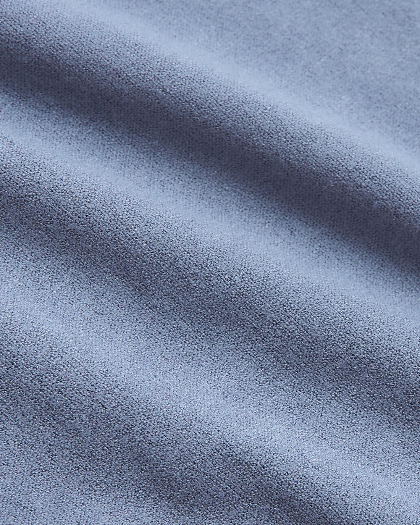 Fiord Tall Dressy Polo's soft, textured blue fabric close-up.