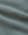 Moss Tall Dressy Polo fabric detail showing tightly woven texture.