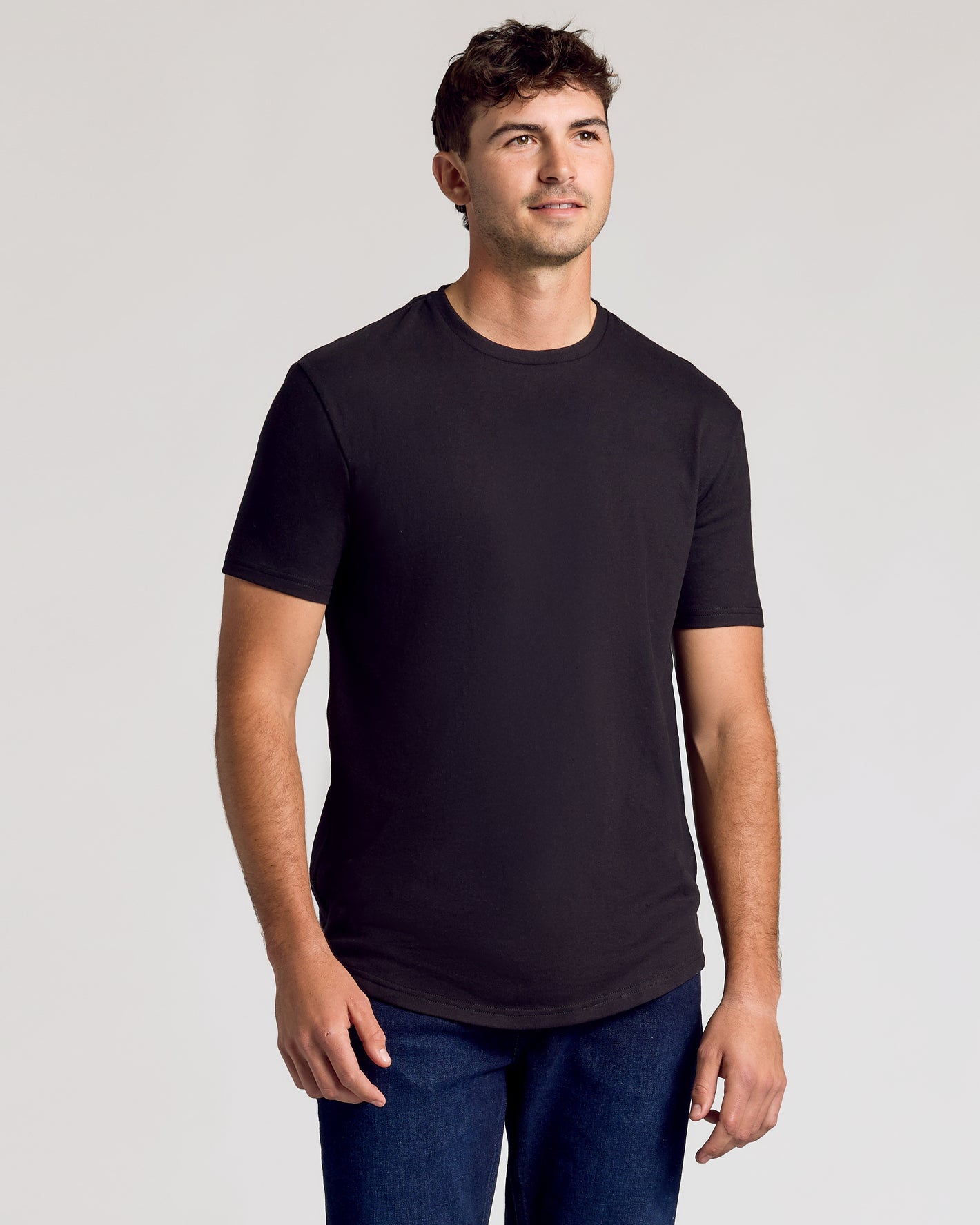 Black Short Sleeve Tall Curved Hem Crew on a man, showcasing fit.