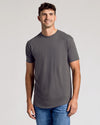 Young man wearing Carbon Short Sleeve Tall Curved Hem Crew and jeans.