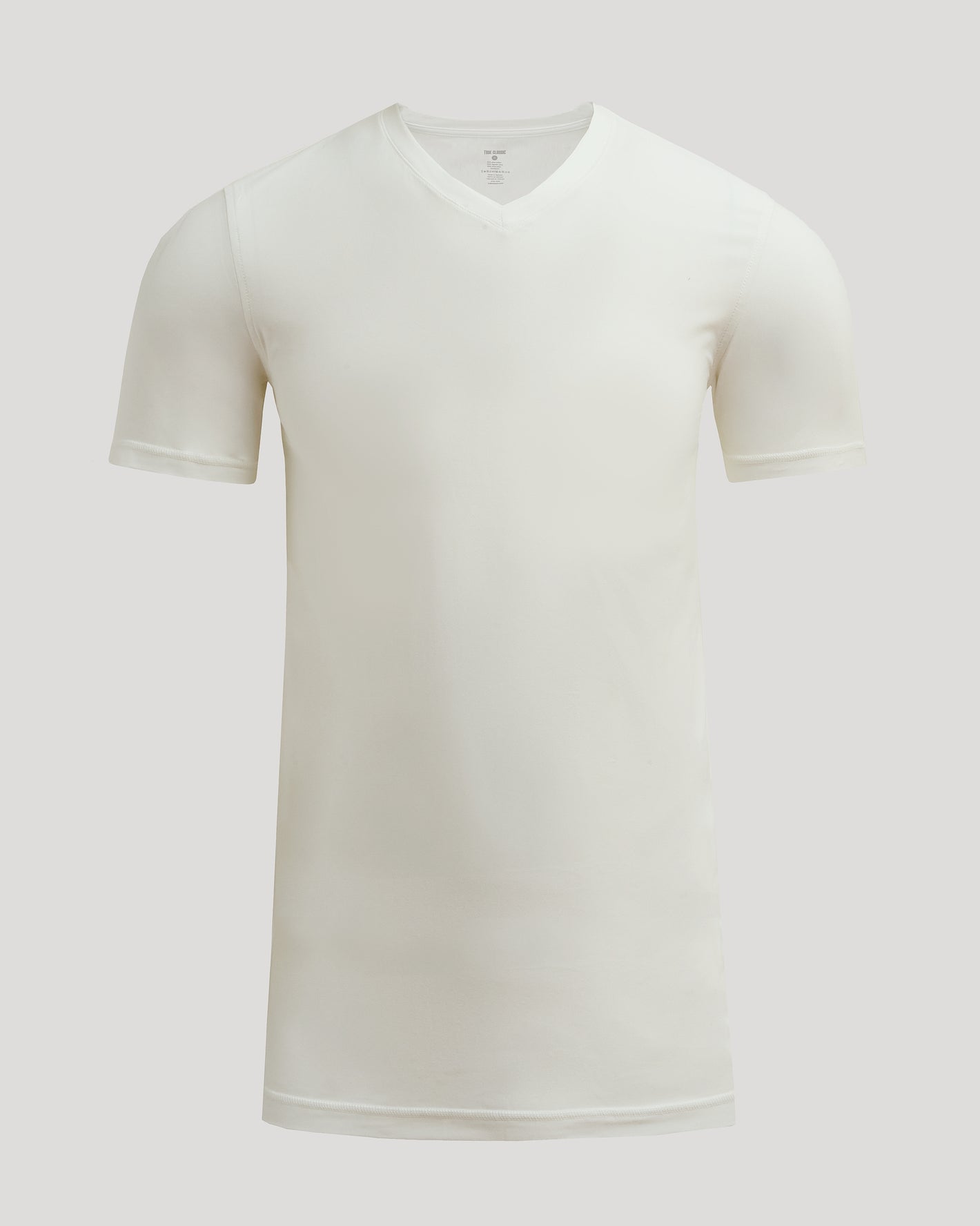Moon Tall Active V-Neck, plain white, short-sleeve, laid out flat.