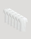 Set of white t-shirts on a light gray background