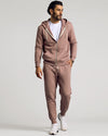 Man wearing Slate Mauve Fleece French Terry Zip Hoodie and joggers.