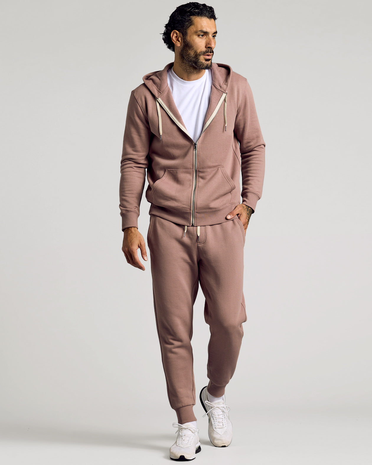 Man wearing Slate Mauve Fleece French Terry Zip Hoodie and joggers.