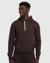 Man wearing Dark Oak Fleece French Terry Pullover Hoodie, smiling.