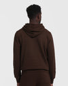 Dark Oak Fleece French Terry Pullover Hoodie from behind, worn with matching pants.