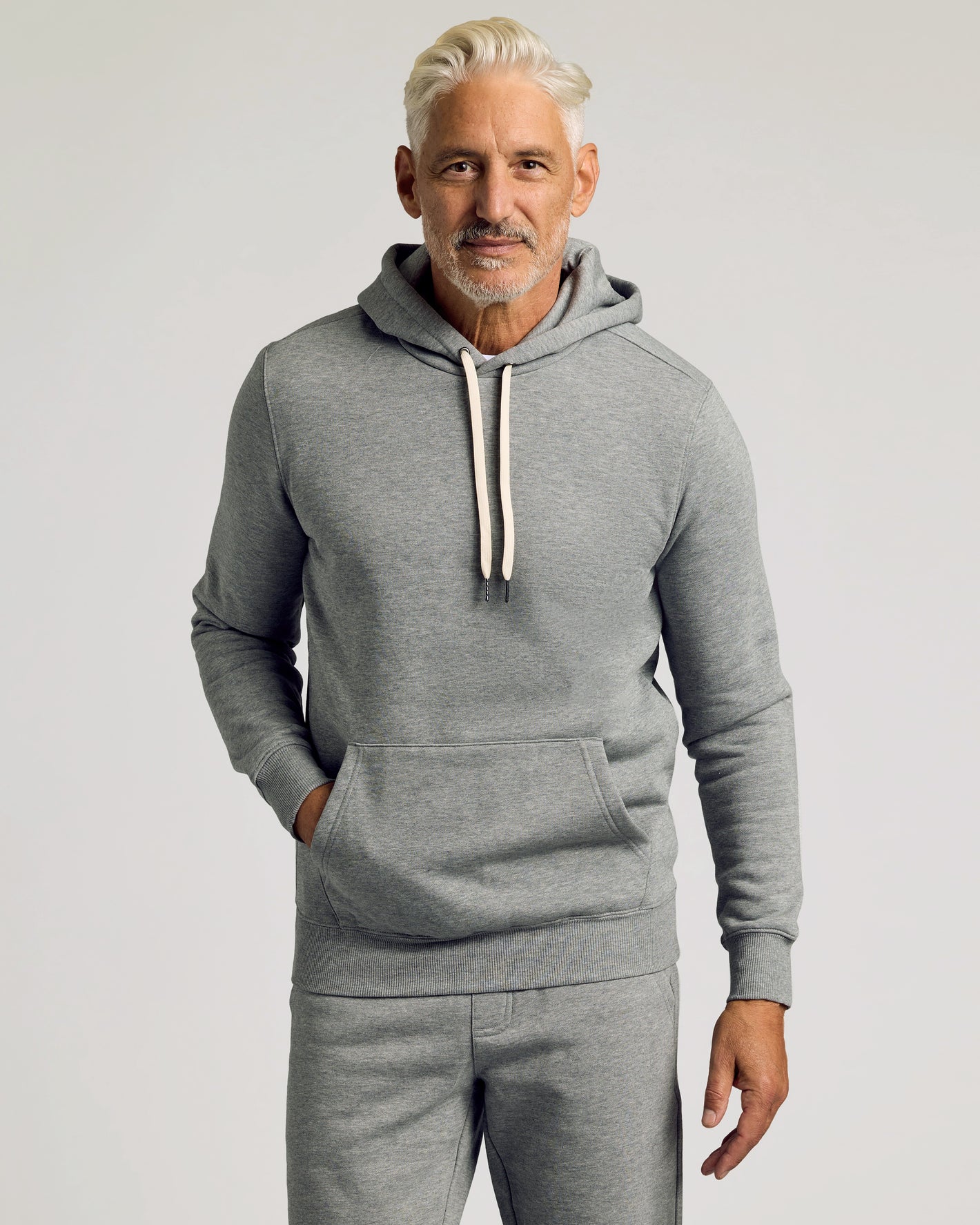 Middle-aged man wearing Dark Heather Gray Fleece French Terry Pullover Hoodie.
