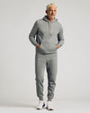 Man wearing Dark Heather Gray Pullover Fleece Hoodie & Jogger 2-Pack.