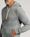 Man wearing Dark Heather Gray Fleece French Terry Pullover Hoodie.
