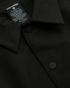 Staple Casual Jacket 3-Pack close-up: black snap-front, collared top.