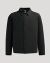 Black Casual Jacket with snap buttons, pointed collar, and discreet pockets.